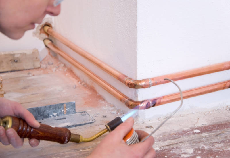 plumber and soldering gun